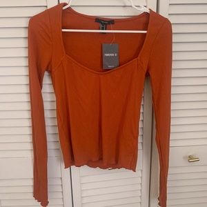 burnt orange long sleeve top